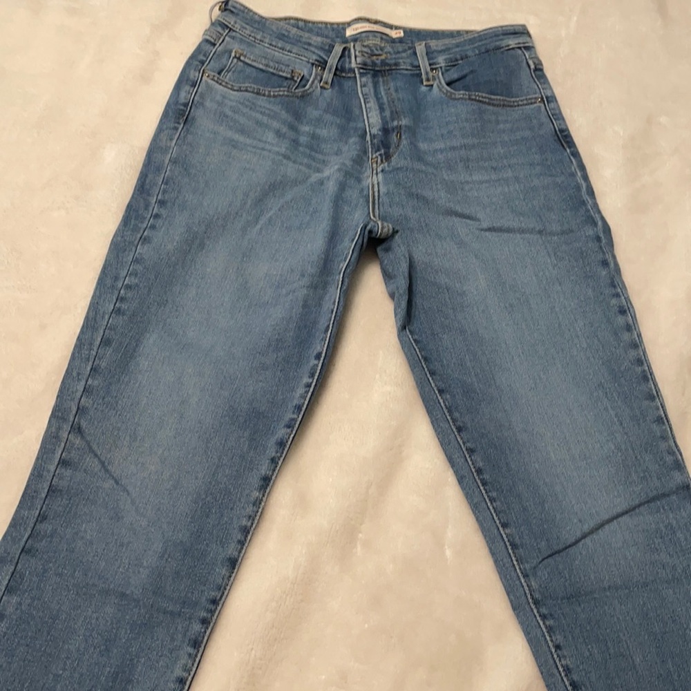 721 High Rise Skinny Jeans